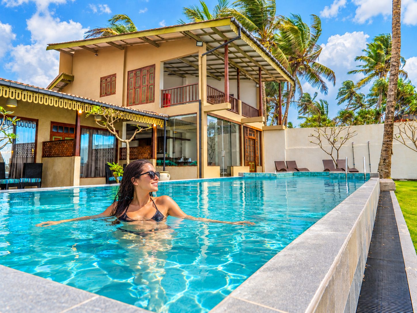 Sunlit Swimming Pool and Villa Grounds